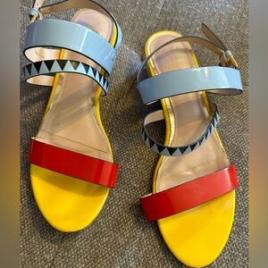 Azura short heeled size 9 women’s blue red and yellow sandals.